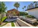 Inviting backyard oasis featuring a sparkling pool, gazebo, and lush landscaping at 2801 E Sylvia St, Phoenix, AZ 85032