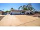 Charming home with a well-maintained exterior, two-car garage, and inviting curb appeal at 2801 E Sylvia St, Phoenix, AZ 85032