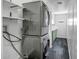 The laundry room features a stacked washer and dryer, and a convenient utility sink at 2801 E Sylvia St, Phoenix, AZ 85032