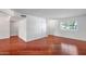 Spacious living room with hardwood floors, ample natural light, and neutral paint for a bright and airy feel at 2801 E Sylvia St, Phoenix, AZ 85032