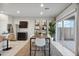 Open concept dining room with lots of natural light and a stylish dining table at 28228 N Nealite Dr, San Tan Valley, AZ 85143