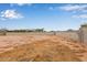 Large, expansive backyard with block wall and plenty of space for landscaping or recreational activities at 2834 N Paisley Ln, Casa Grande, AZ 85122