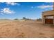 Expansive backyard featuring a blank canvas for landscaping or your dream custom pool at 2834 N Paisley Ln, Casa Grande, AZ 85122