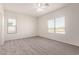 Spacious bedroom with carpeted floors and windows, perfect for relaxation at 2834 N Paisley Ln, Casa Grande, AZ 85122