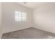 Well-lit bedroom features a window, providing natural light and a comfortable space at 2834 N Paisley Ln, Casa Grande, AZ 85122