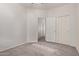 Bedroom featuring plush carpeting, fresh paint and closet doors, ready for personalization at 2834 N Paisley Ln, Casa Grande, AZ 85122