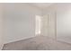 Bedroom featuring plush carpeting, fresh paint and closet doors, ready for personalization at 2834 N Paisley Ln, Casa Grande, AZ 85122