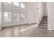 Spacious living area with modern flooring and large windows providing ample natural light at 2834 N Paisley Ln, Casa Grande, AZ 85122
