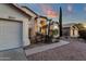 Attractive single-Gathering house featuring desert landscaping, a three-car garage, and a cozy entryway at 3037 E Bighorn Ave, Phoenix, AZ 85048