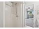 Bright white shower and updated fixtures with connecting access to bedroom and patio at 3301 E Earll Dr # 210, Phoenix, AZ 85018
