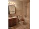 A bathroom featuring a single sink vanity, toilet, and shower/tub combo at 3618 W Las Palmaritas Dr, Phoenix, AZ 85051