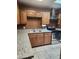 Kitchen featuring wood cabinets, countertops and stainless steel appliances at 3618 W Las Palmaritas Dr, Phoenix, AZ 85051