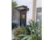 Charming front entrance with a welcoming sunflower wreath and decorative plants at 3637 E Monterosa St # 5, Phoenix, AZ 85018