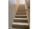 Tiled stairway with handrail leading to the upper level of the home at 3637 E Monterosa St # 5, Phoenix, AZ 85018