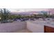 Desert landscape with a tall privacy wall surrounding an empty space at 36801 N Long Rifle Rd, Carefree, AZ 85377