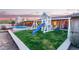 Beautiful backyard with a pool, playground, lush lawn, and dome observatory at 36801 N Long Rifle Rd, Carefree, AZ 85377