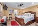 Comfortable primary bedroom with a spacious layout and soft, natural lighting at 36801 N Long Rifle Rd, Carefree, AZ 85377