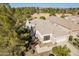 Beautiful single-story home featuring manicured landscaping, a tile roof, and proximity to a lush green golf course at 3820 E Carson Rd, Phoenix, AZ 85042