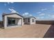 Back exterior featuring the patio and large undeveloped backyard at 4022 S 178Th Ln, Goodyear, AZ 85338