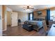 Spacious main bedroom boasting a sitting area, ensuite bathroom, and ample natural light at 5445 S 239Th Dr, Buckeye, AZ 85326