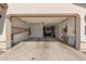 Spacious garage with ample storage and a functional layout for vehicles and equipment at 7442 W Redbird Rd, Peoria, AZ 85383