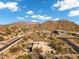 Desert home with desert landscaping, a pool, and a stunning mountain backdrop at 8540 E Mcdowell Rd # 19, Mesa, AZ 85207