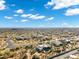 Panoramic aerial view of a sprawling desert neighborhood with luxurious homes and mature landscaping at 8540 E Mcdowell Rd # 19, Mesa, AZ 85207