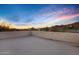 Wide angle shot of a rooftop deck with mountain views at dusk at 8540 E Mcdowell Rd # 19, Mesa, AZ 85207