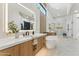 Gorgeous main bathroom with soaking tub, double sink vanity, and glass shower at 9159 N 108Th Pl, Scottsdale, AZ 85259
