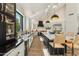 Spacious modern kitchen featuring a large island, sleek countertops, and stainless steel appliances at 9159 N 108Th Pl, Scottsdale, AZ 85259