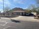 Single story home with a large front yard and driveway in front of a beautiful mountain view at 9804 N 5Th Ave, Phoenix, AZ 85021