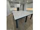 Bright kitchen features a large island with sleek countertops and ample cabinet space at 10039 S 23Rd Dr, Phoenix, AZ 85041