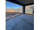 Covered patio offers an outdoor living space with mountain views and a blank canvas to create the perfect backyard at 10039 S 23Rd Dr, Phoenix, AZ 85041