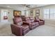 Theater room offering comfortable seating, a ceiling fan, and entertainment space at 10249 E Kinetic Dr, Mesa, AZ 85212