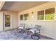 Charming covered patio with outdoor seating, perfect for relaxation at 10410 E San Tan Blvd, Sun Lakes, AZ 85248