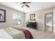 Bedroom with plush carpet flooring and picture window at 10410 E San Tan Blvd, Sun Lakes, AZ 85248