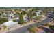 Sweeping aerial view of property, with desert landscaping, mature trees, and convenient street access at 12836 N 60Th St, Scottsdale, AZ 85254