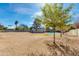 The backyard features mature trees, a sparkling pool, and ample space for outdoor living and entertaining at 12836 N 60Th St, Scottsdale, AZ 85254