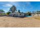 Large backyard featuring a pool, covered patio, and gravel landscaping at 12836 N 60Th St, Scottsdale, AZ 85254