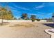 Spacious backyard featuring desert landscaping and ample space for outdoor activities and relaxation at 12836 N 60Th St, Scottsdale, AZ 85254