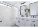 Bathroom with a bathtub/shower combination and double sink vanity at 13238 W Market St, Surprise, AZ 85374