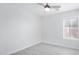 Bedroom with a ceiling fan and a bright, neutral color palette at 13238 W Market St, Surprise, AZ 85374