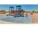 Community playground with play structure featuring slides, climbing apparatus, and shade coverings at 1361 W Hess Ave, Coolidge, AZ 85128