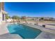 Inviting pool area with desert landscape views and lounge seating at 1363 E Amberwood Dr, Phoenix, AZ 85048