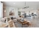 Open-concept living area seamlessly connects the kitchen and cozy Gathering space at 1404 W Kennedy Ave, Coolidge, AZ 85128