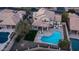 This desert home shows an outdoor living space with pool and lounging area at 14052 S 24Th Way, Phoenix, AZ 85048