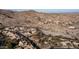 An aerial view showcases a desert community with green belts, parks and mountain views at 14052 S 24Th Way, Phoenix, AZ 85048