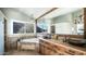 Rustic bathroom featuring double sinks, granite counters, jacuzzi tub, and mountain views at 14052 S 24Th Way, Phoenix, AZ 85048