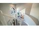 Bright foyer showcasing spiral staircase, dining room, and views of the neighborhood at 14052 S 24Th Way, Phoenix, AZ 85048