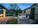 Backyard patio featuring dining table, grill, and verdant plants for al fresco dining at 14052 S 24Th Way, Phoenix, AZ 85048